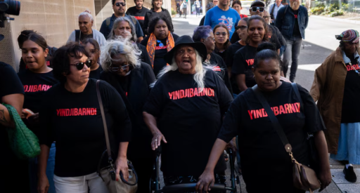 Indigenous people from Yindjibarndi Nation arrive at the Federal Court for the landmark decision. (ABC News: Cason Ho) In front